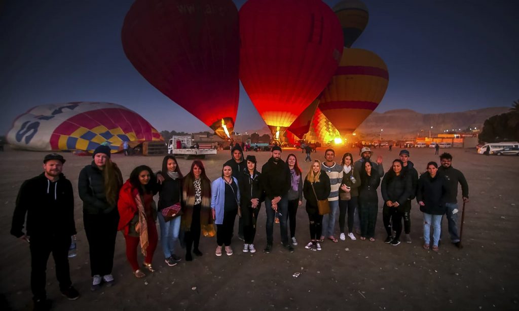 People taken photo in front of the balloons in Cappadocia