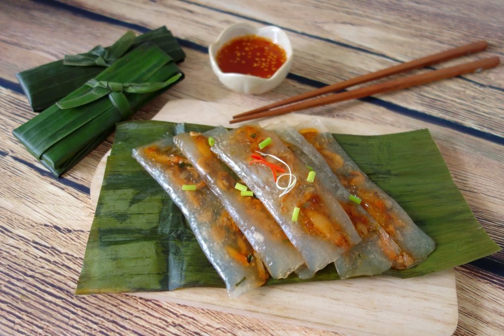 Additionally, try bánh nậm, which is like a flattened cousin of bánh bèo, with a little pork tossed in and wrapped in banana leaves as a thin tasty rectangle.